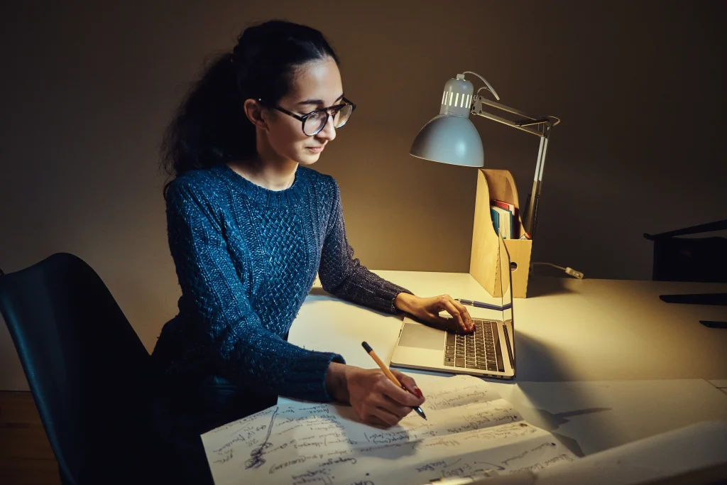 young-female-freelancer-is-working-her-new-project-home